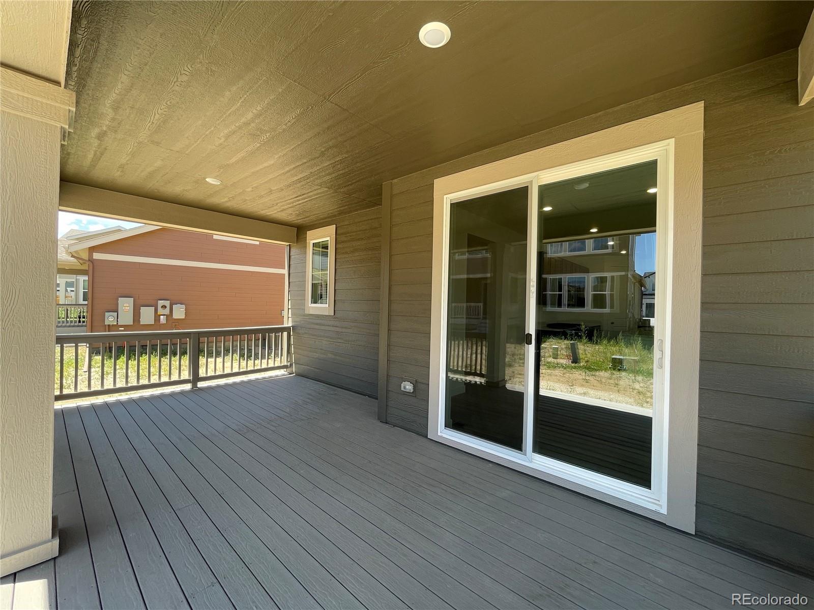 4598 Windmill Drive Brighton, CO 80601 - Photo 12 of 21 a view of an entryway door with wooden floor