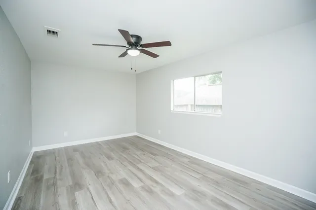 a bathroom with a sink a toilet and a bathtub