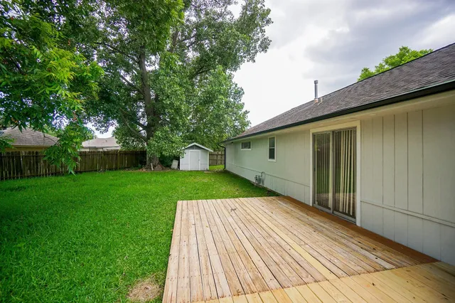 a view of a backyard with a garden