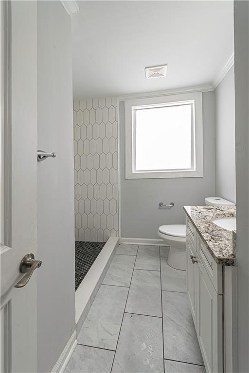 1892 Terry Mill Road Southeast Atlanta, GA 30316 - Photo 11 of 25 a bathroom with a granite countertop sink a toilet and a shower
