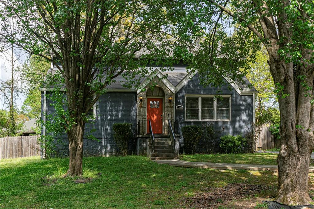 1892 Terry Mill Road Southeast Atlanta, GA 30316 - Photo 24 of 25 a view of a backyard with potted plants and large trees
