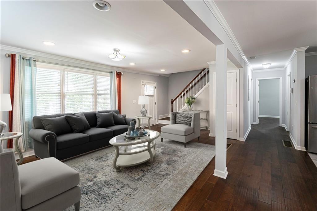 1892 Terry Mill Road Southeast Atlanta, GA 30316 - Photo 5 of 25 a living room with furniture and a large window