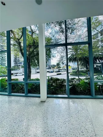 a view of a garden with a bench in patio