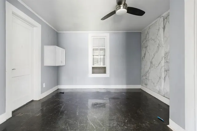 an empty room with windows