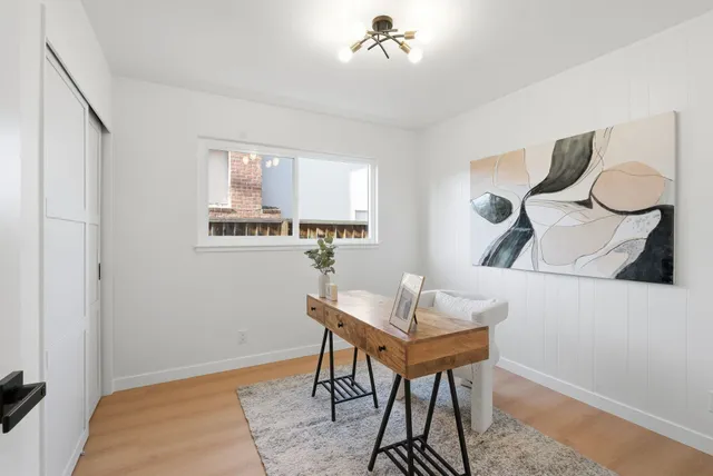 a view of a chairs and table in backyard