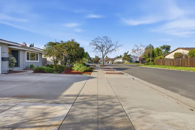 a view of a street with houses