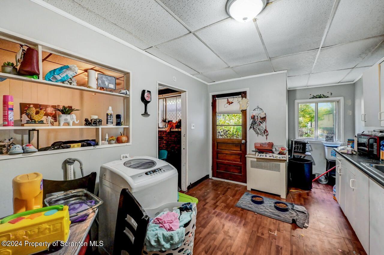 938 Providence Road Scranton, PA 18508 - Photo 12 of 22 a view of a workspace with furniture and a workspace
