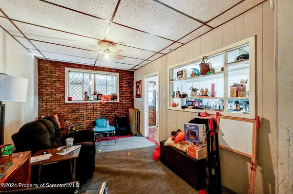 a outdoor living space with furniture and a window