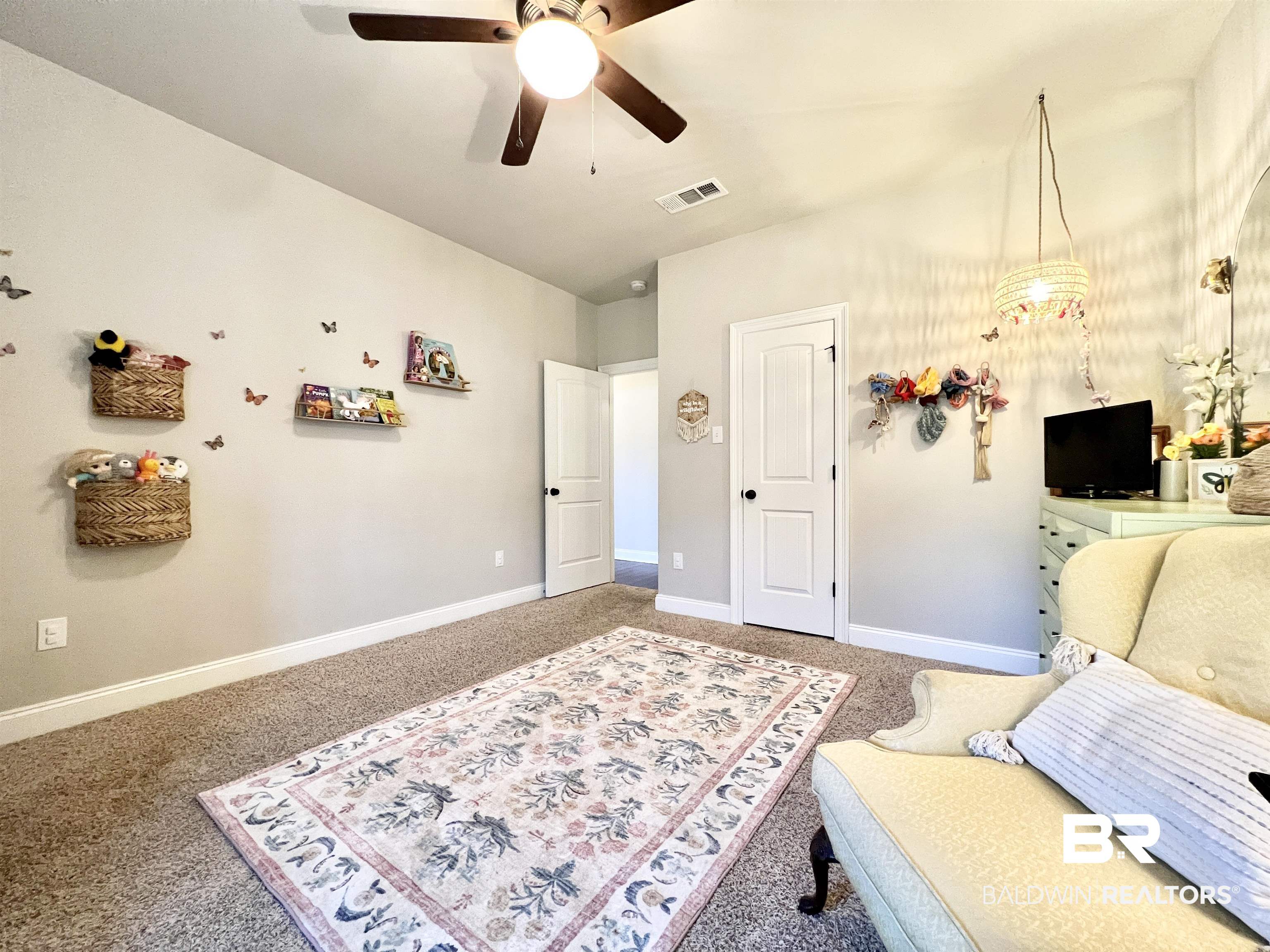 32290 Calder Court Daphne, AL 36527 - Photo 37 of 59 Living area featuring carpet flooring and ceiling fan