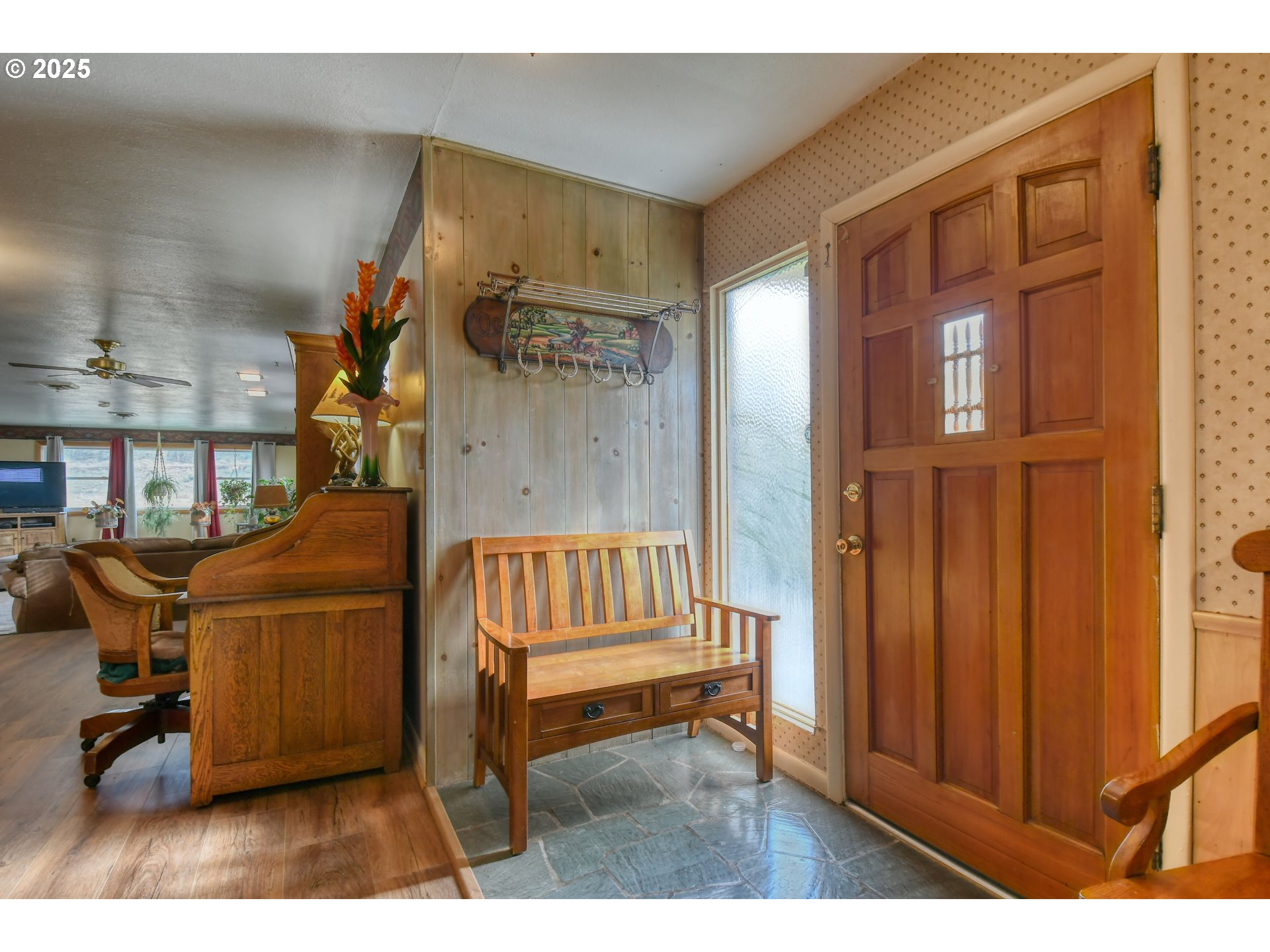 70930 Highway 207 Echo, OR 97826 - Photo 12 of 48 a living room with furniture a rug and a window