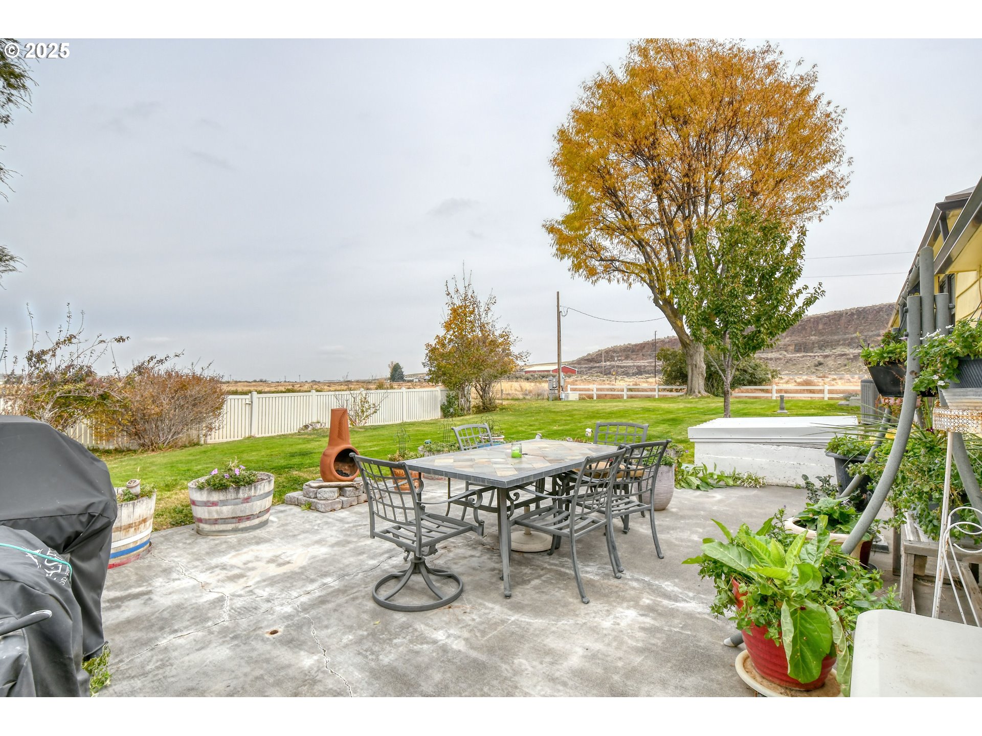 70930 Highway 207 Echo, OR 97826 - Photo 40 of 48 a view of a chairs and table in the garden