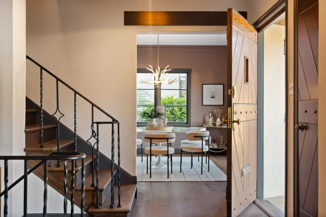 a view of a dining room with furniture window and outside view