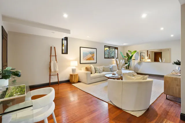 a bedroom with a bed and cabinets