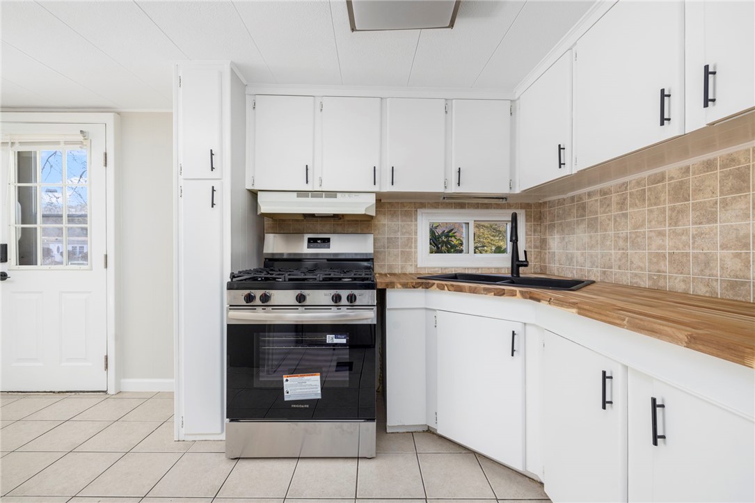12 Valiant Drive Coventry, RI 02816 - Photo 13 of 33 New countertops, sink, appliances, light fixtures