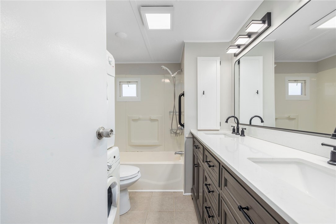 12 Valiant Drive Coventry, RI 02816 - Photo 15 of 33 Solid double vanity, new mirrors, light fixtures