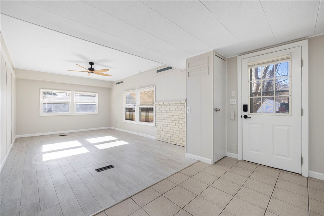 12 Valiant Drive Coventry, RI 02816 - Photo 4 of 33 Tall ceilings, generous sunlight, open concept, fresh paint, modern light fixtures