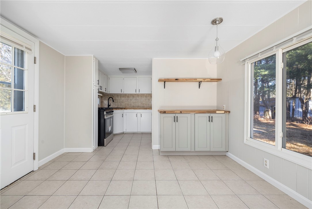 12 Valiant Drive Coventry, RI 02816 - Photo 10 of 33 Additional cabinets and shelving added!