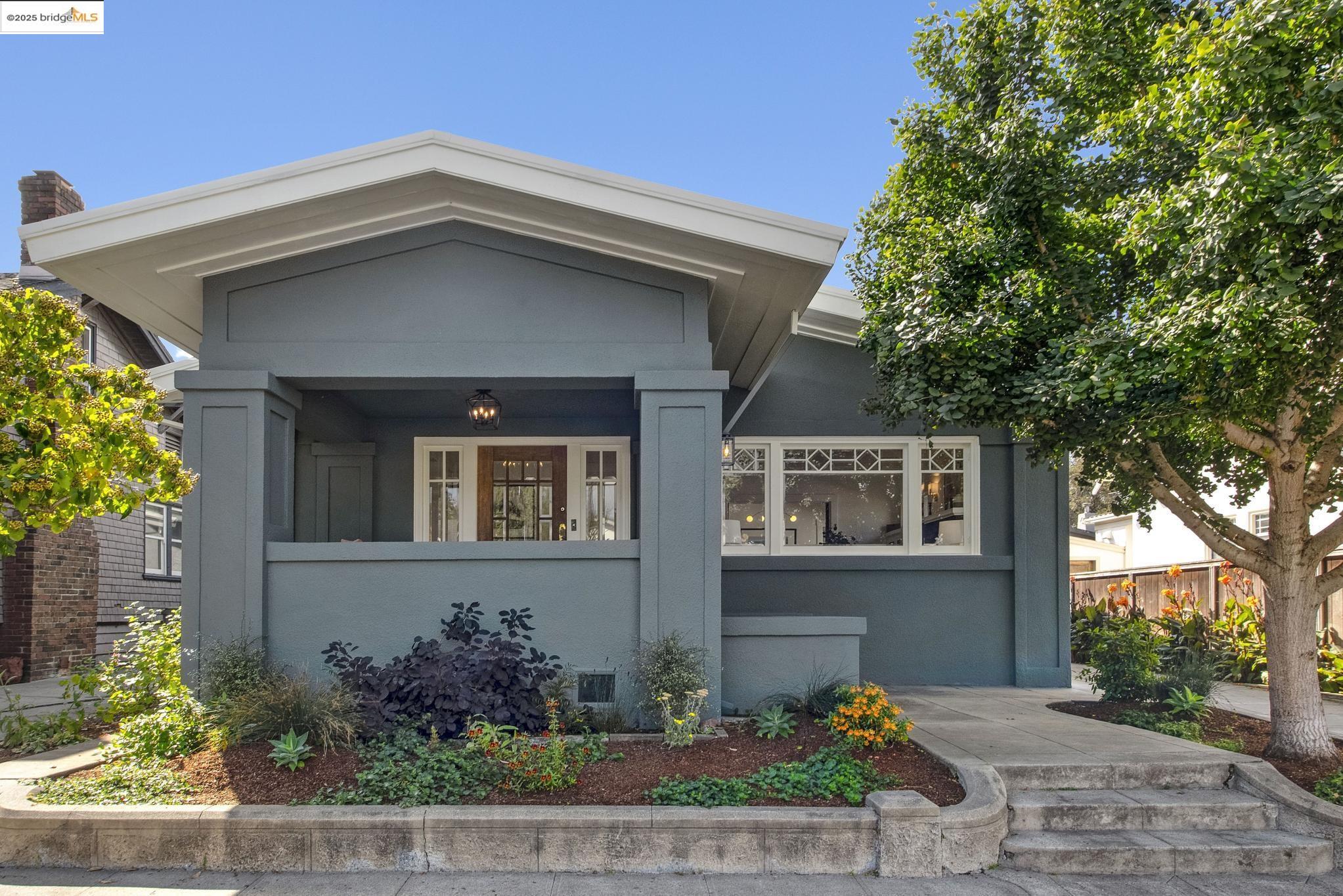 View of front of property featuring stucco siding