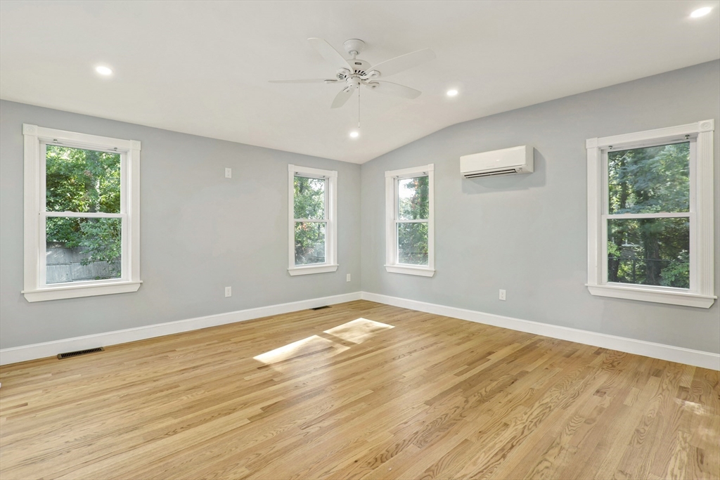 10 Briar Patch Lane Mashpee, MA 02649 - Photo 16 of 38 a view of an empty room with wooden floor and a window