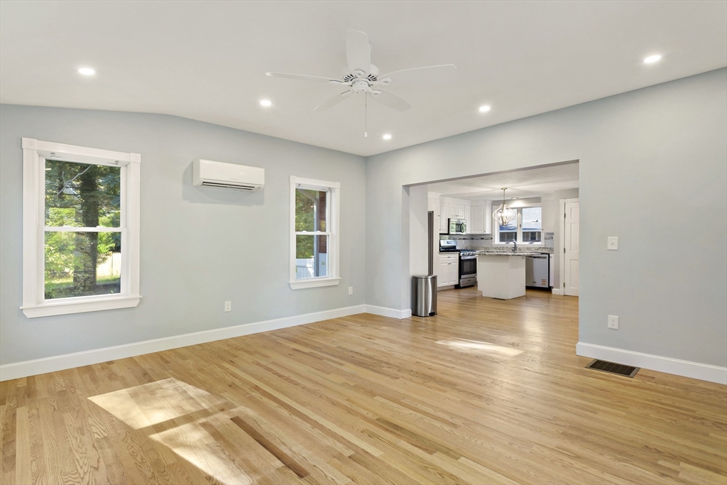 10 Briar Patch Lane Mashpee, MA 02649 - Photo 17 of 38 a view of an empty room with a window and wooden floor