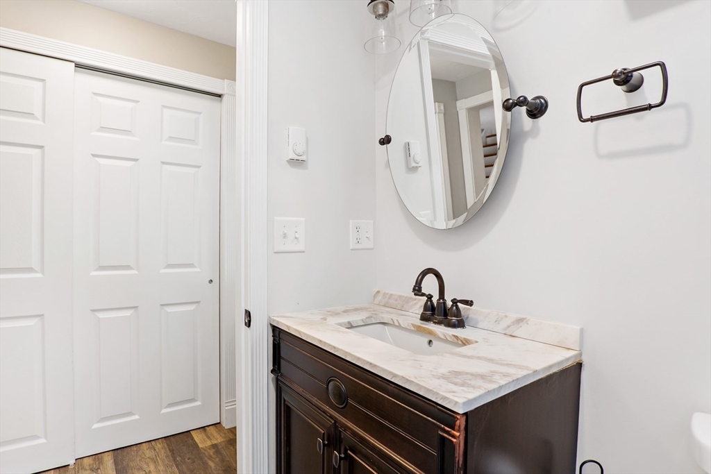 10 Briar Patch Lane Mashpee, MA 02649 - Photo 19 of 38 a bathroom with a sink and a mirror