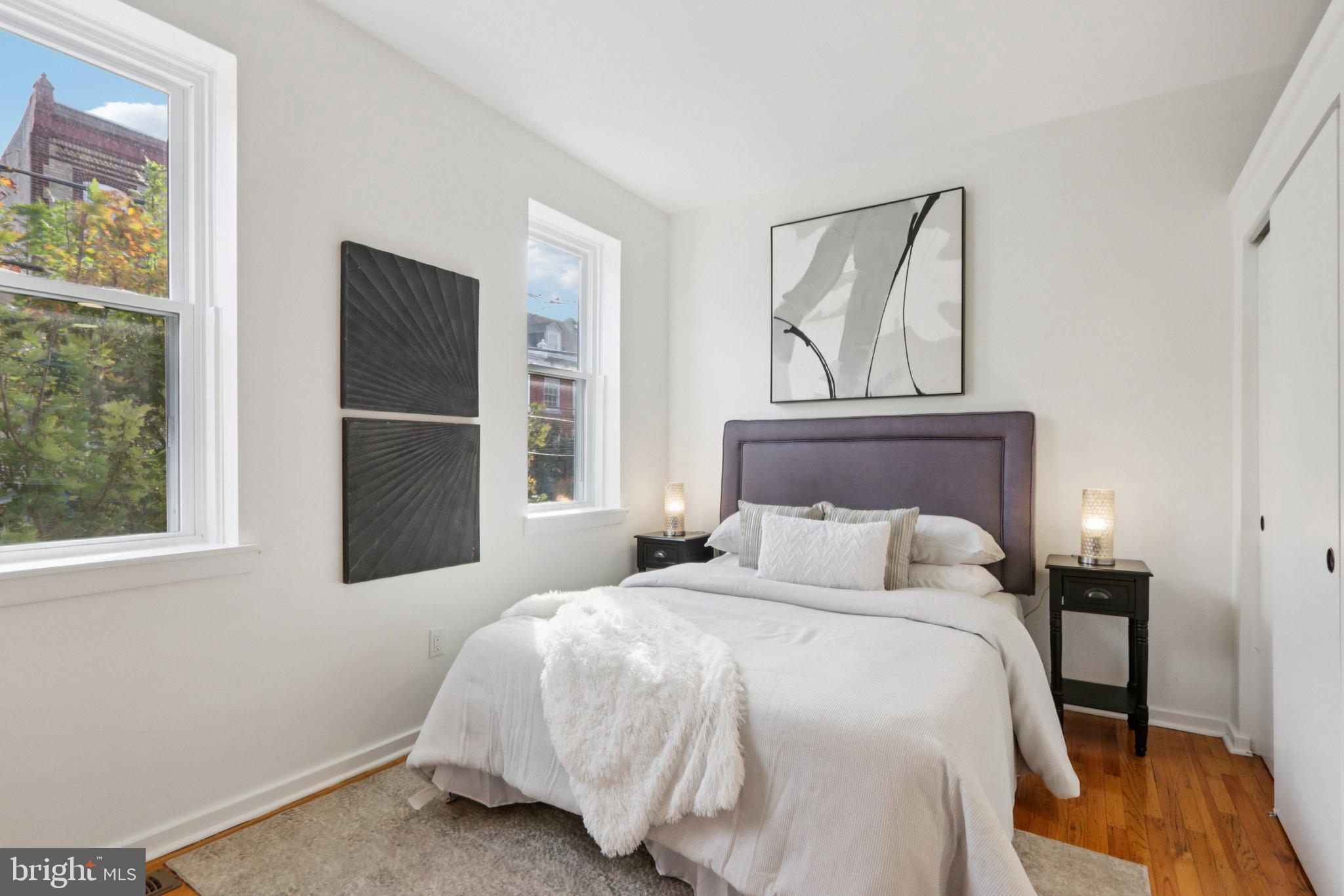 764 South Front Street Philadelphia, PA 19147 - Photo 30 of 46 a bedroom with a bed and window