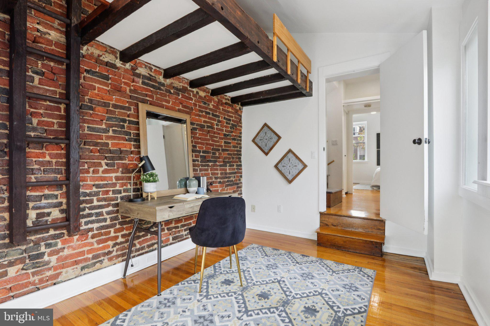 764 South Front Street Philadelphia, PA 19147 - Photo 37 of 46 a workspace room with furniture and wooden floor