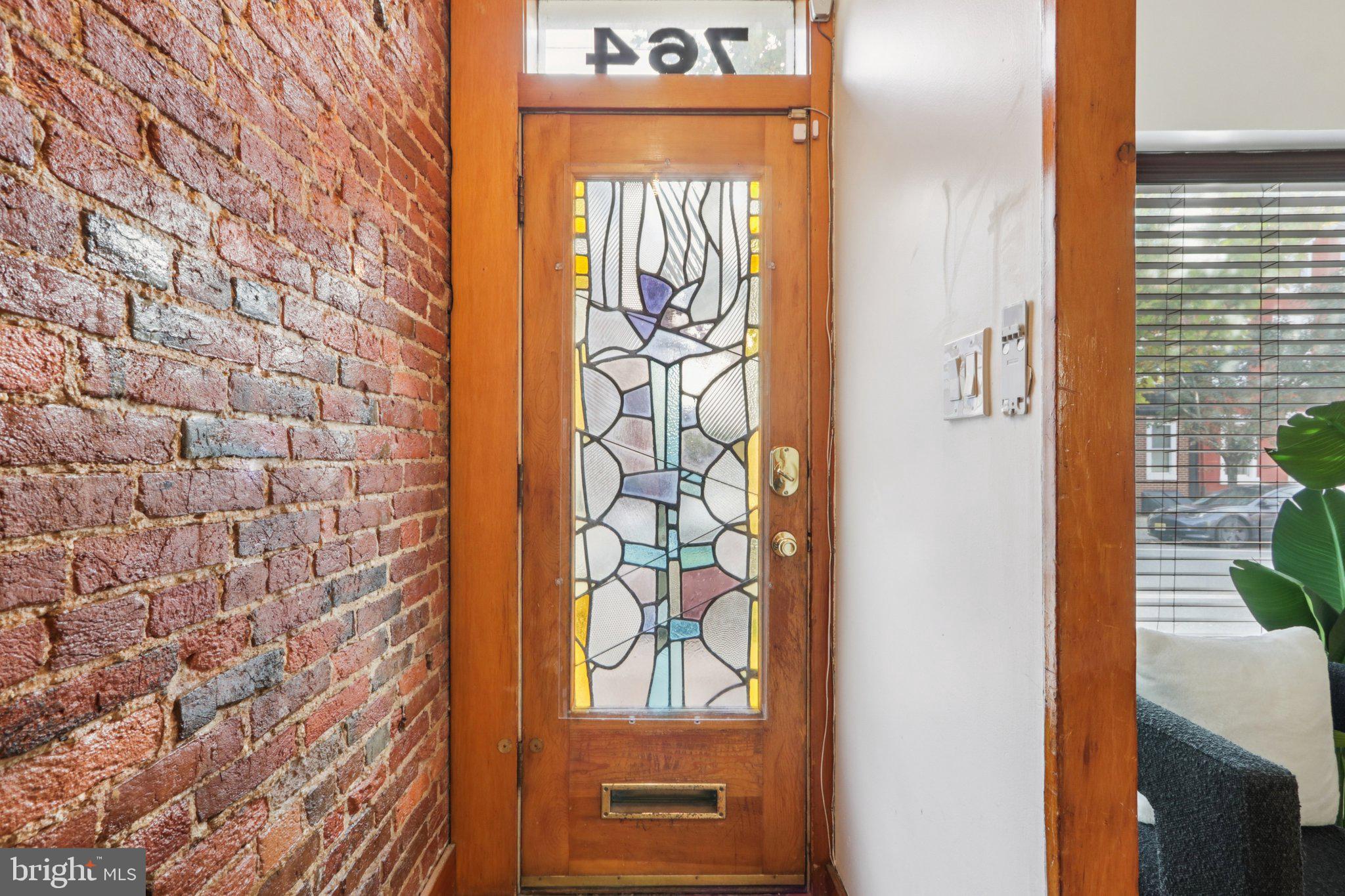 764 South Front Street Philadelphia, PA 19147 - Photo 4 of 46 a view of a door and chair in a room