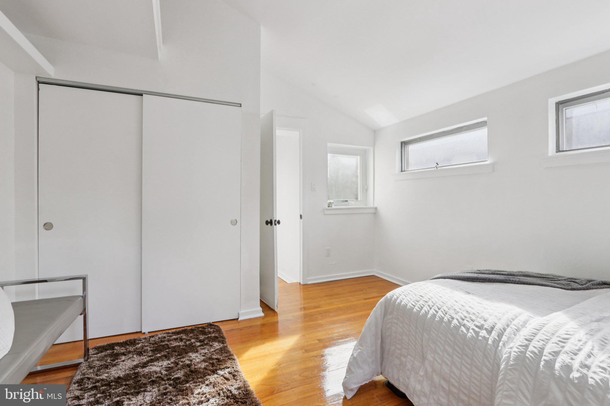 764 South Front Street Philadelphia, PA 19147 - Photo 41 of 46 a bedroom with a bed and a window