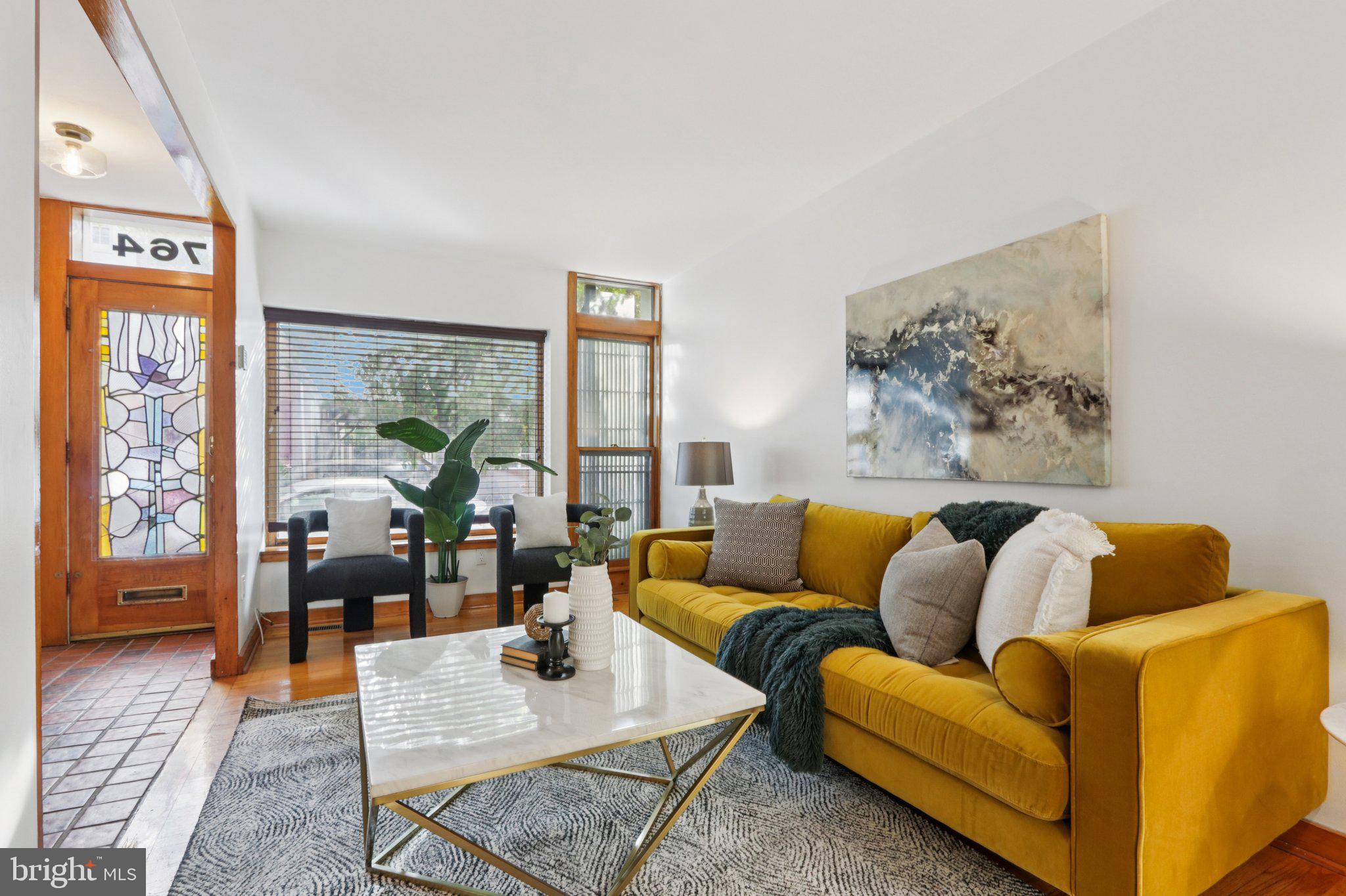 764 South Front Street Philadelphia, PA 19147 - Photo 5 of 46 a living room with furniture and a large window