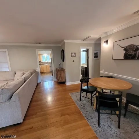 a view of a livingroom with furniture and window