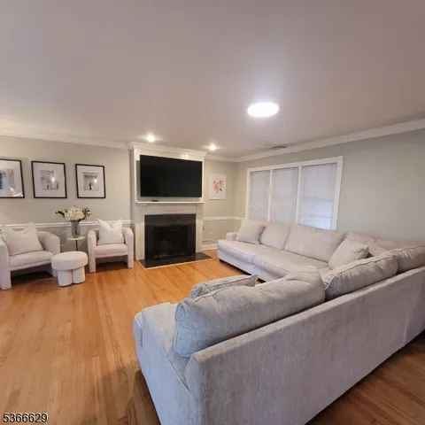 a view of backyard with swimming pool and patio