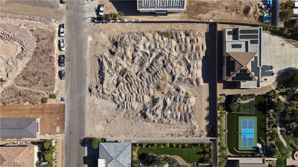 1243 Gloria Mountain Road Henderson, NV 89002 - Photo 4 of 12 A spacious, buildable lot awaits your vision, framed by neighboring luxury amenities.