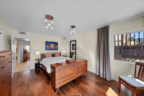 a bed room with a bed and furniture