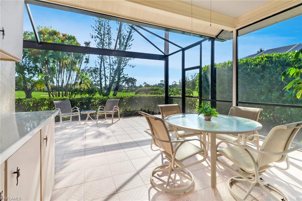 11745 Quail Village Way Naples, FL 34119 - Photo 14 of 24 Sunroom featuring a wealth of natural light