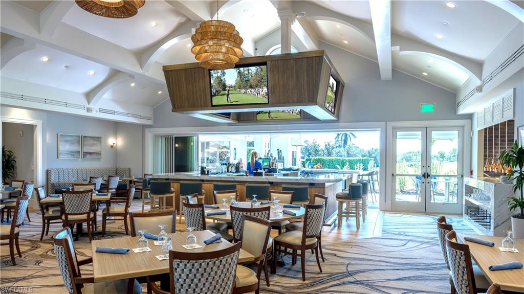 11745 Quail Village Way Naples, FL 34119 - Photo 15 of 24 Dining room featuring high vaulted ceiling, french doors, beam ceiling, and recessed lighting