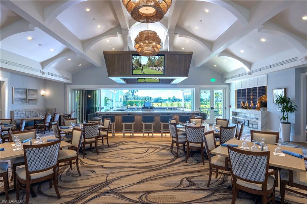 11745 Quail Village Way Naples, FL 34119 - Photo 16 of 24 Dining room with beamed ceiling, high vaulted ceiling, and recessed lighting