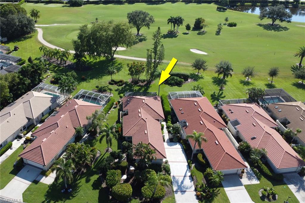 11745 Quail Village Way Naples, FL 34119 - Photo 23 of 24 Birds eye view of property featuring a water view