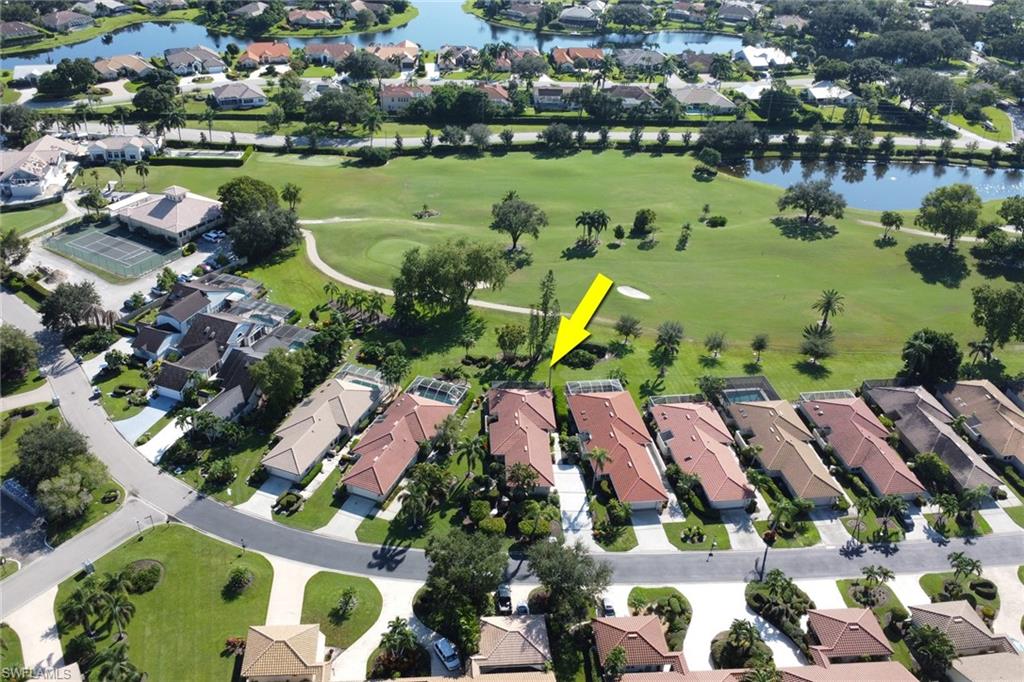 11745 Quail Village Way Naples, FL 34119 - Photo 24 of 24 Birds eye view of property with a water view
