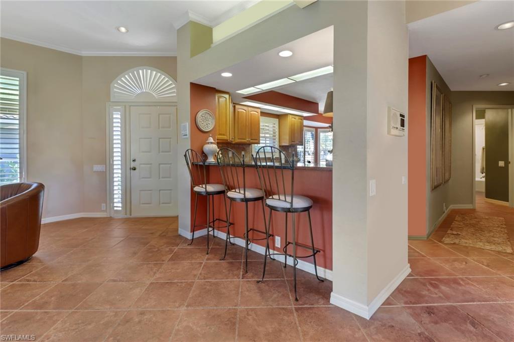 11745 Quail Village Way Naples, FL 34119 - Photo 9 of 24