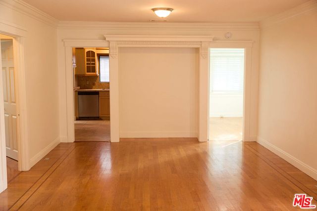 a view of a livingroom with wooden floor