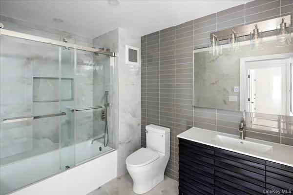 a black and white photo of a white building