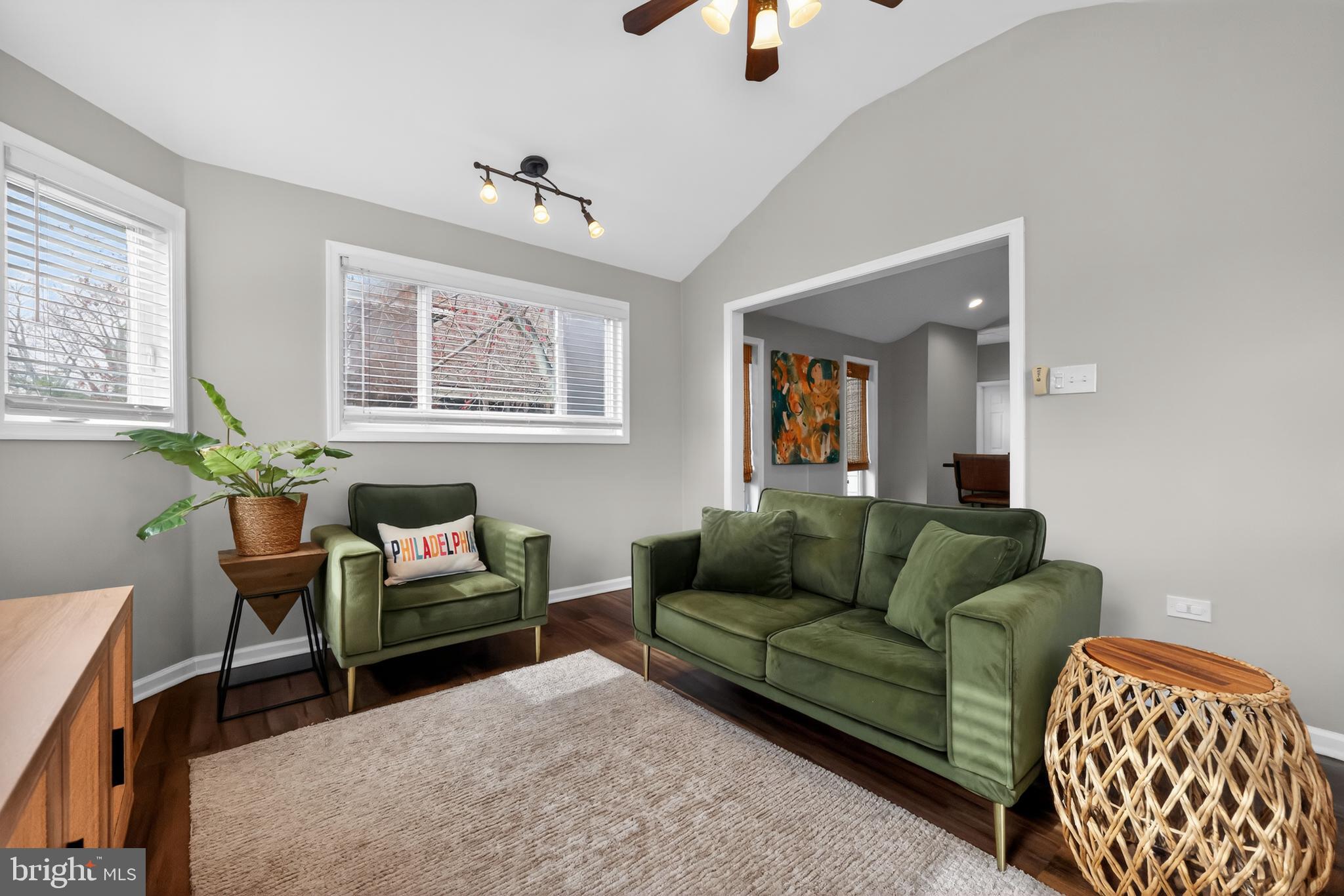 208 Richey Avenue Collingswood, NJ 08107 - Photo 19 of 35 a living room with furniture and a potted plant