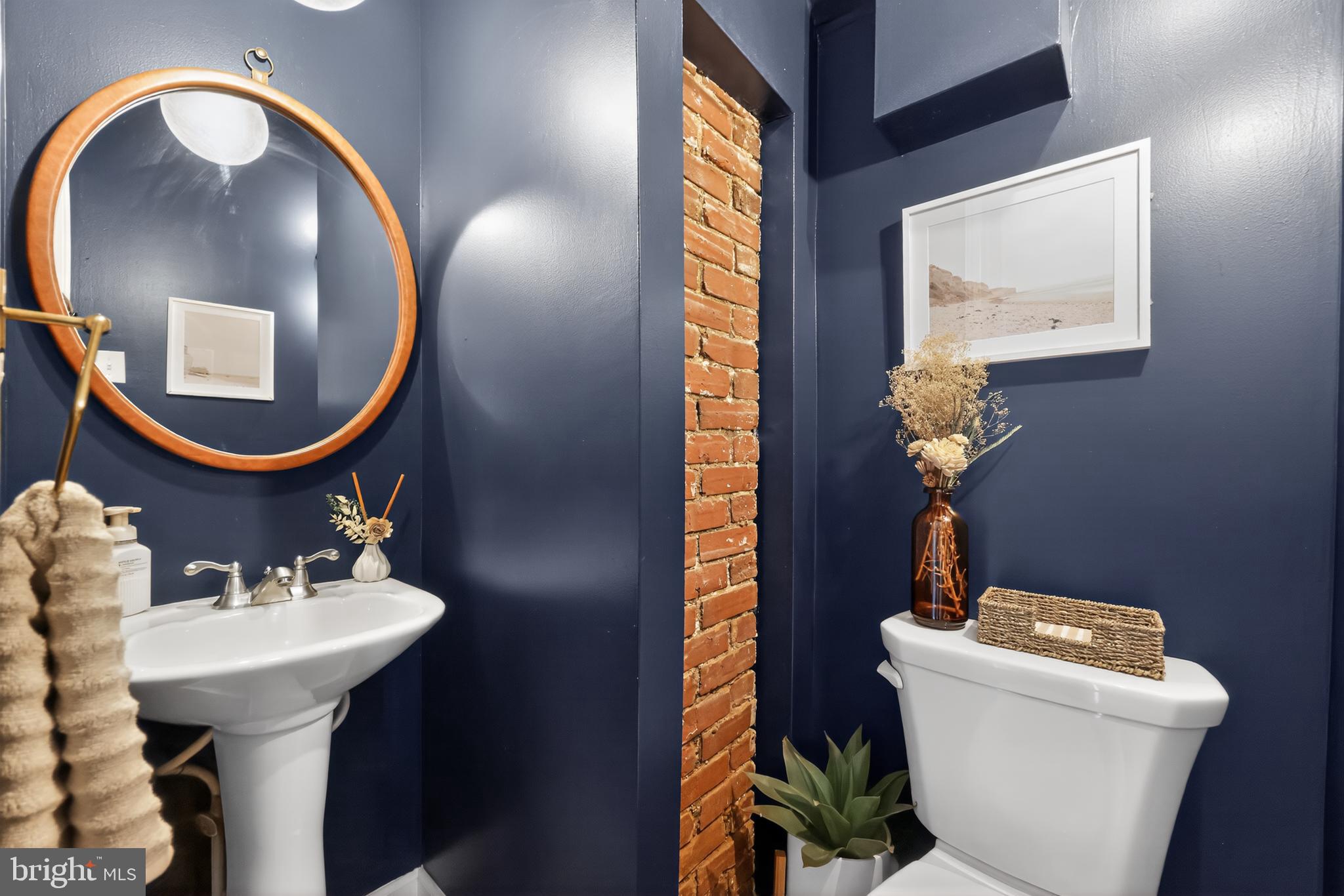 208 Richey Avenue Collingswood, NJ 08107 - Photo 20 of 35 a bathroom with a toilet sink and mirror