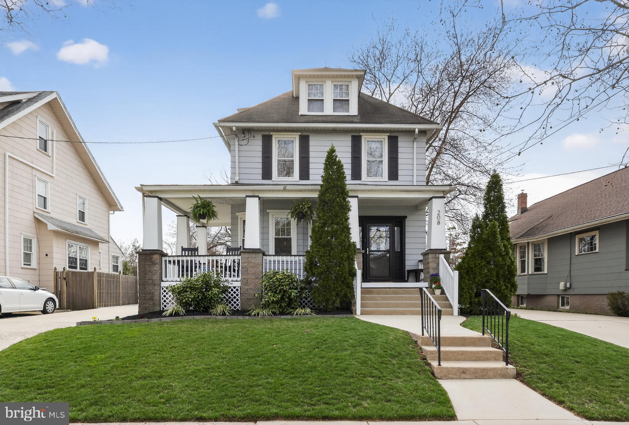 208 Richey Avenue Collingswood, NJ 08107 - Photo 2 of 35 a front view of a house with a yard