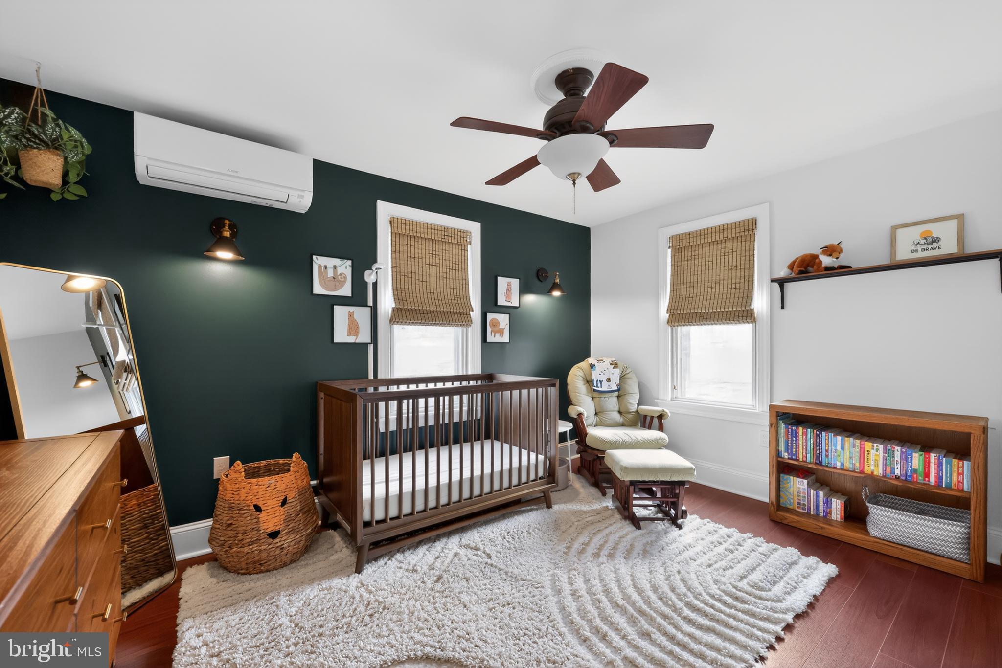 208 Richey Avenue Collingswood, NJ 08107 - Photo 25 of 35 a bedroom with a bed and wooden floor