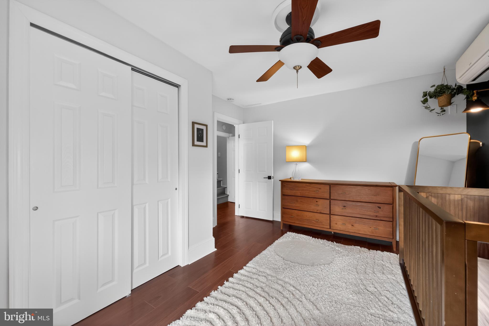 208 Richey Avenue Collingswood, NJ 08107 - Photo 26 of 35 a bedroom with a bed and a dresser