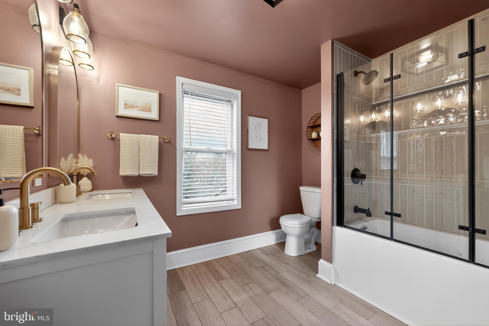 208 Richey Avenue Collingswood, NJ 08107 - Photo 27 of 35 a bathroom with a sink a toilet and shower