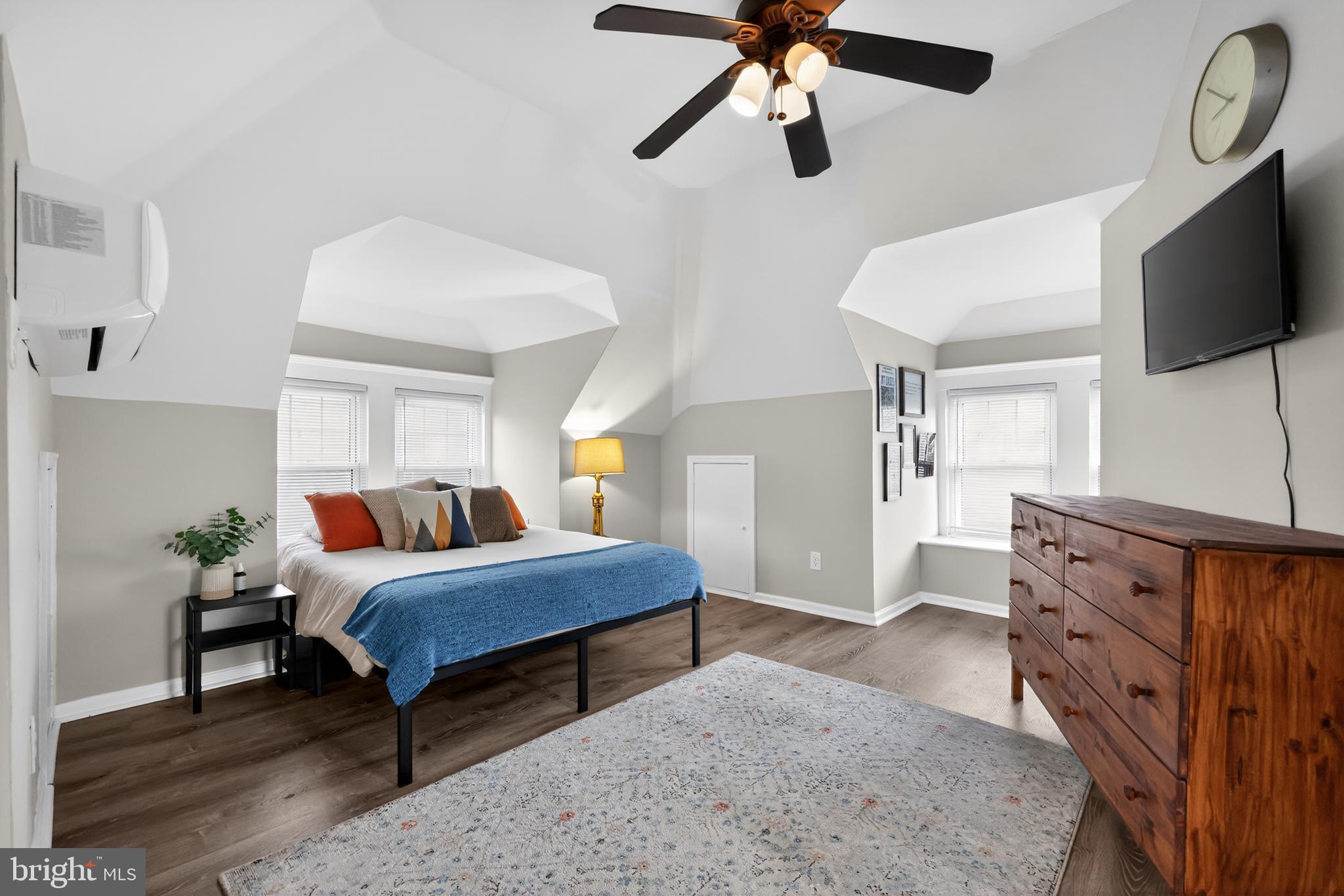 208 Richey Avenue Collingswood, NJ 08107 - Photo 29 of 35 a bedroom with furniture and a flat screen tv