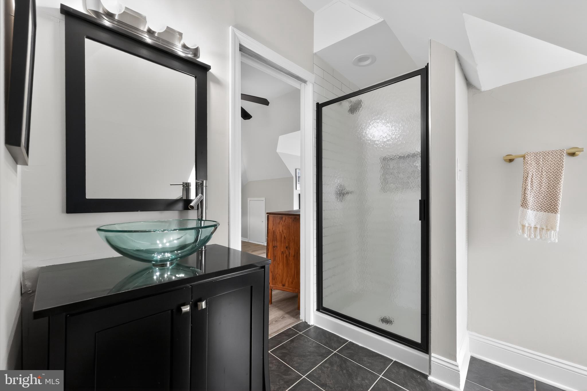 208 Richey Avenue Collingswood, NJ 08107 - Photo 31 of 35 a bathroom with a granite countertop sink and a mirror